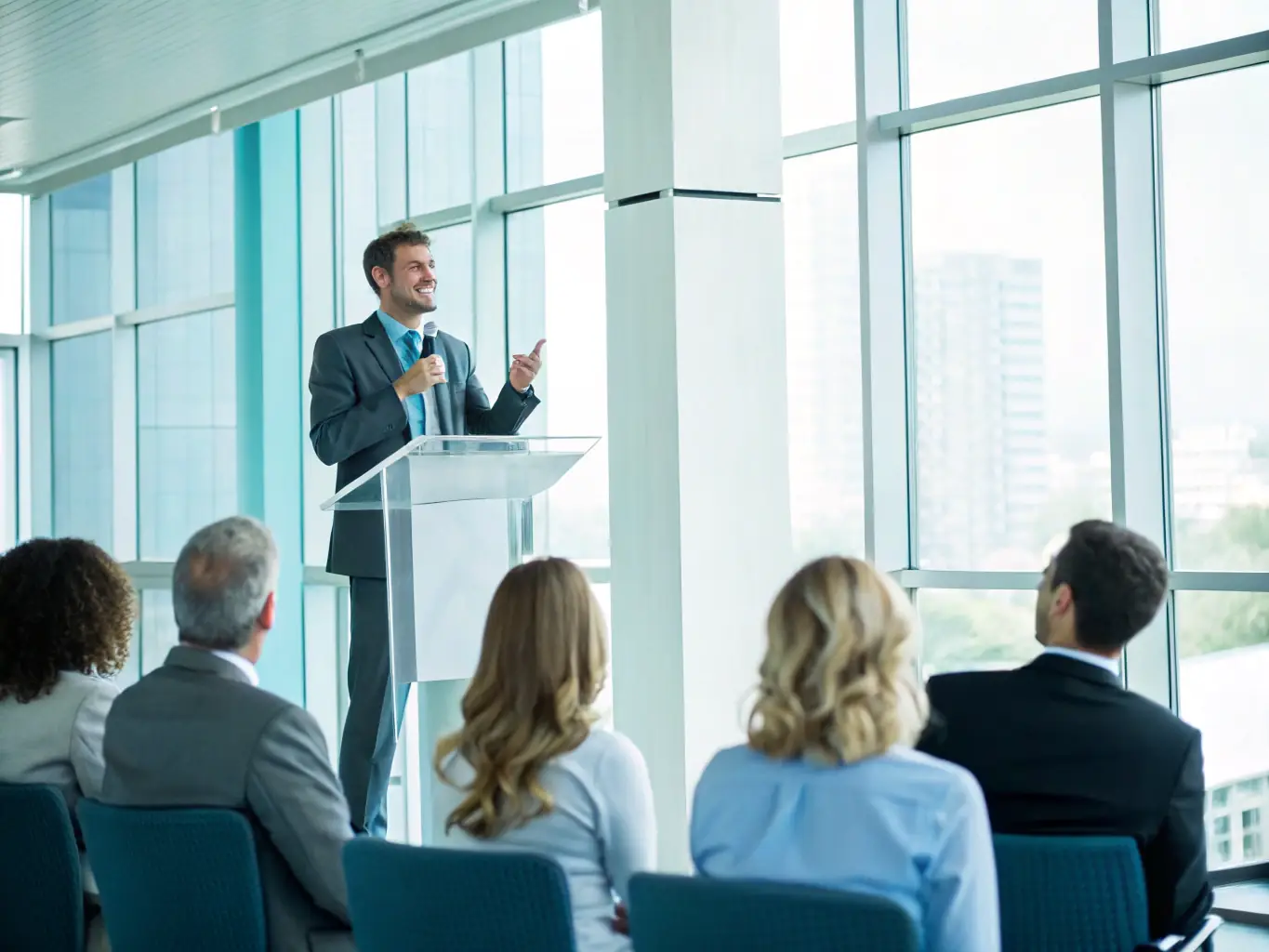 An image depicting a keynote speaker delivering an engaging presentation at a lobsterspace.fun conference, with attendees attentively listening and taking notes.